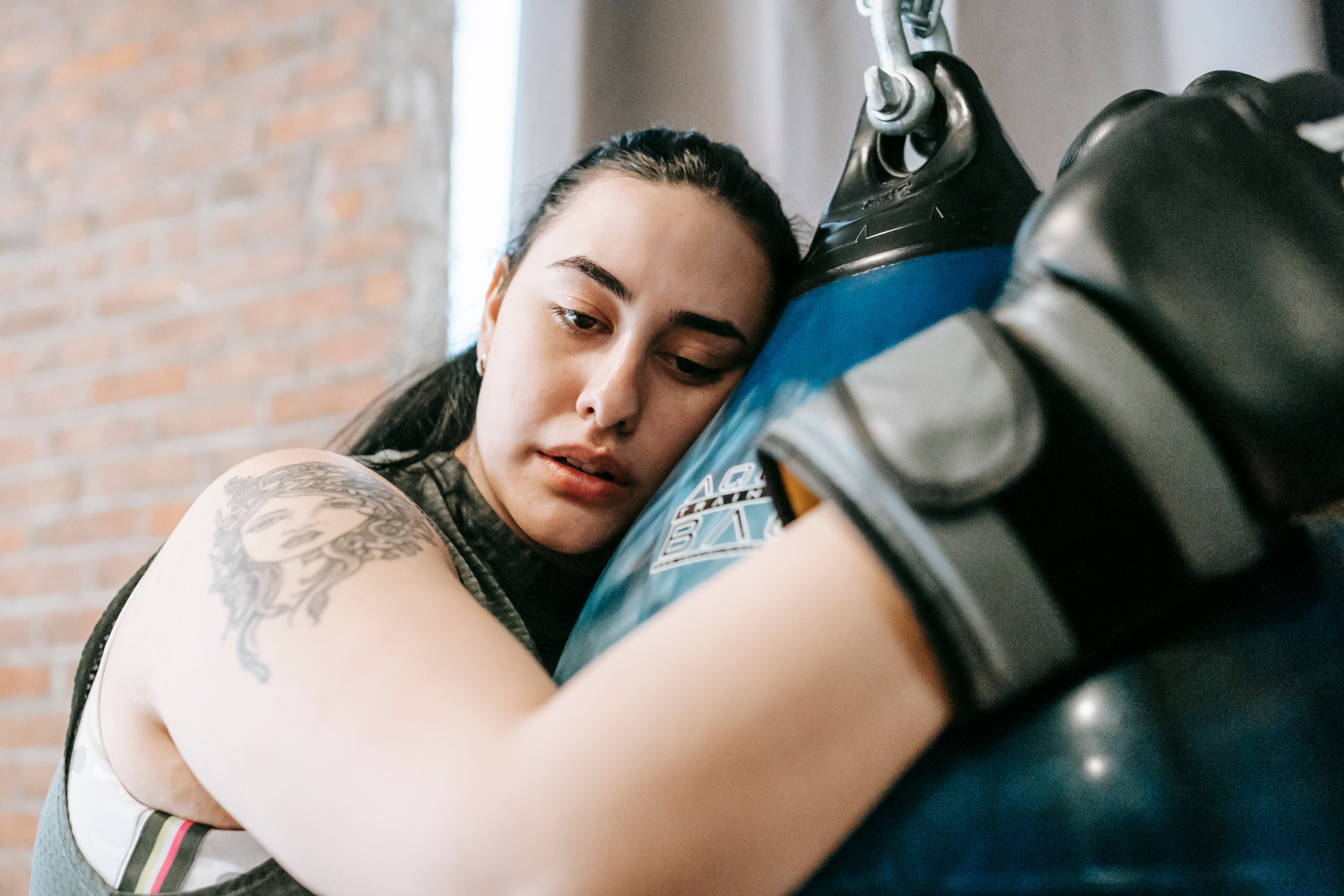 Woman being strong and pushing through.
